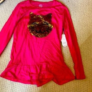 This “flippy” shirt from wonder nation is new with tags size (7-8)